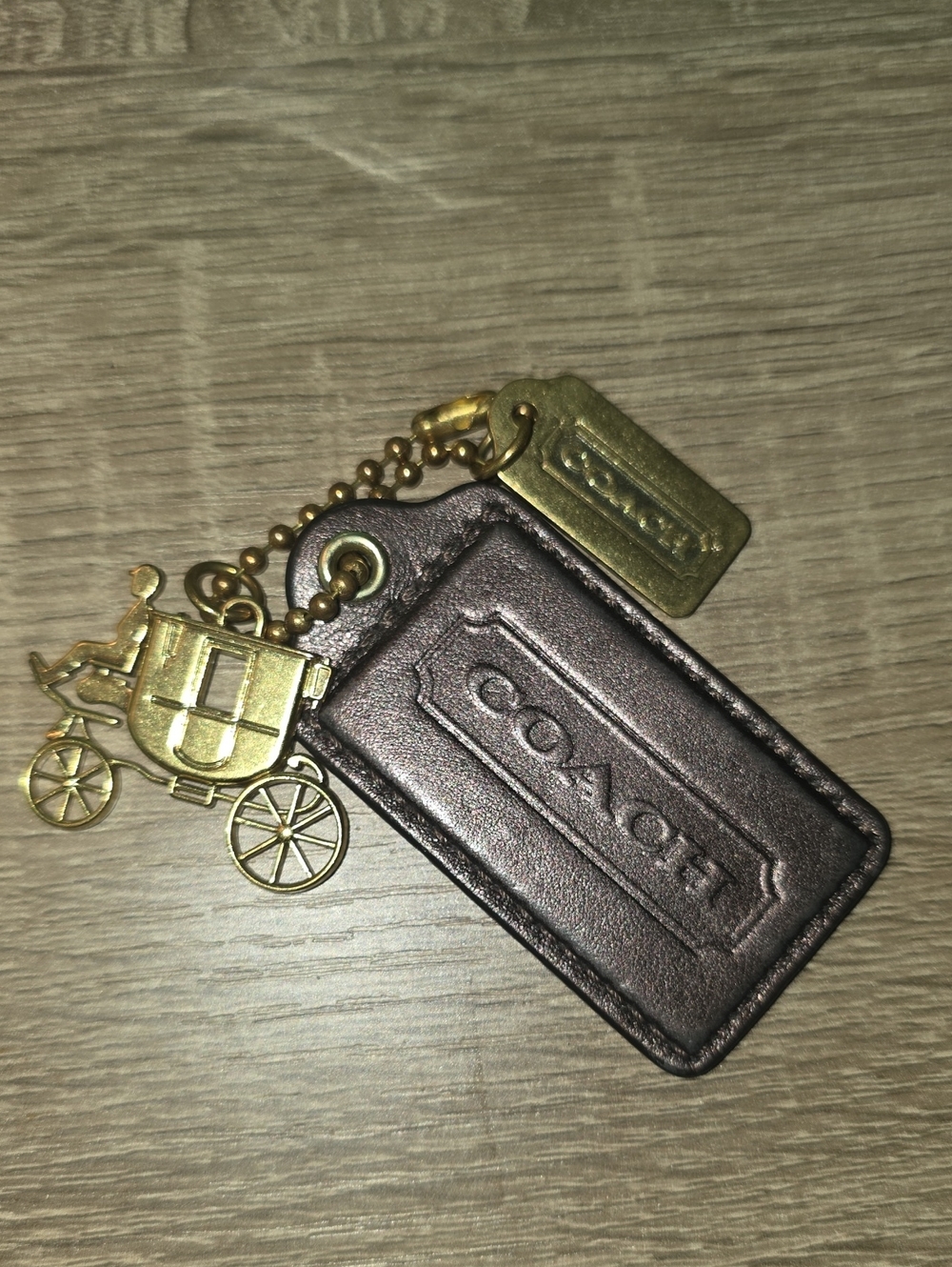 Coach Horse and Carriage Metallic Brown Hang Tag